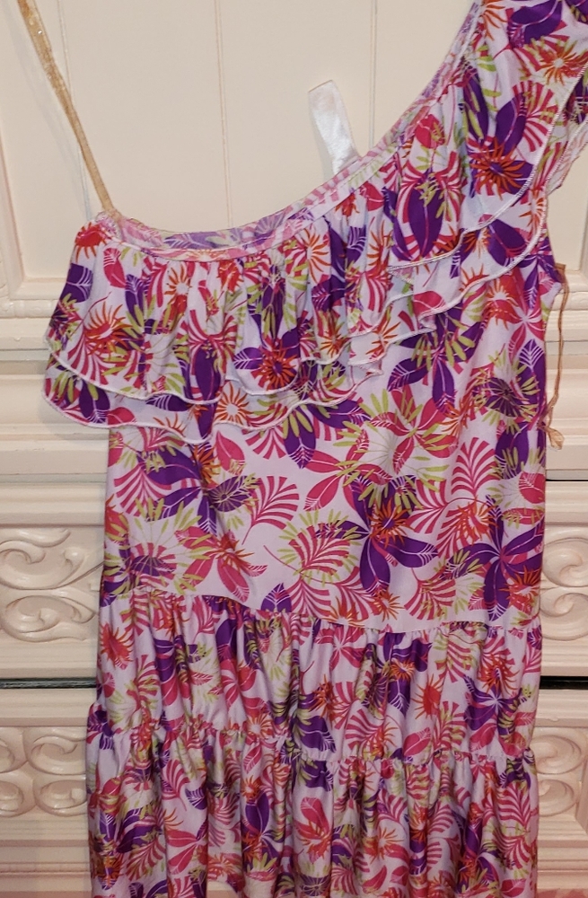 Size 13/15 dress used in good condition.